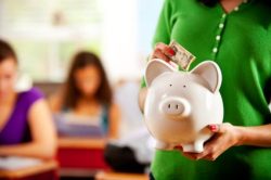 woman holding piggy bank