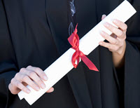 graduate holding diploma